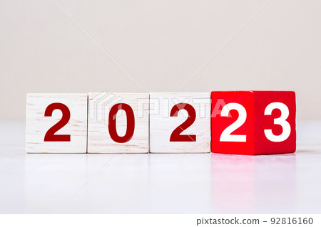 flipping block 2022 to 2023 text on table. Resolution, strategy, plan, goal, motivation, reboot, business and New Year holiday concepts flipping block 2022 to 2023 text on table. Resolution, strategy, plan, goal, motivation, reboot, business and New Year holiday concepts 92816160