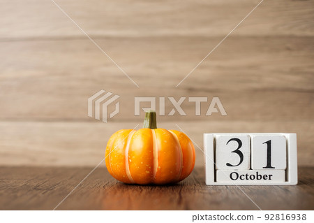 Happy Halloween day with pumpkin and 31 October calendar. Trick or Threat, Hello October, fall autumn, Festive, party and holiday concept Happy Halloween day with pumpkin and 31 October calendar. Trick or Threat, Hello October, fall autumn, Festive, party and holiday concept 92816938