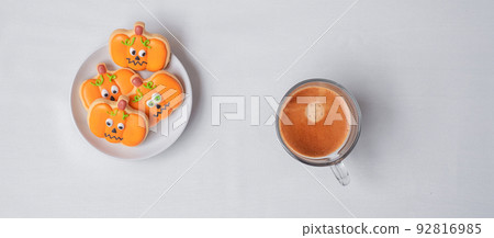 hot espresso coffee  or chocolate cup with funny Halloween Cookies. Happy Halloween day, Trick or Threat, Hello October, fall autumn, Traditional, party and holiday concept 92816985