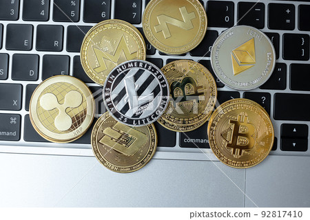 golden and silver Cryptocurrency on keyboard laptop, Bitcoin , Ethereum, Litecoin, Dash, Monero, Zcach and Ripple coins. Crypto is Digital Money within the blockchain network golden and silver Cryptocurrency on keyboard laptop, Bitcoin , Ethereum, Litecoin, Dash, Monero, Zcach and Ripple coins. Crypto is Digital Money within the blockchain network 92817410