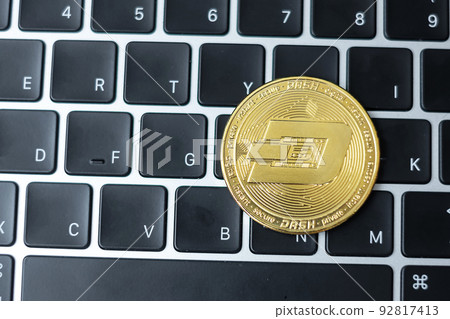 golden Cryptocurrency on keyboard laptop, Dash coin. Crypto is Digital Money within the blockchain network golden Cryptocurrency on keyboard laptop, Dash coin. Crypto is Digital Money within the blockchain network 92817413
