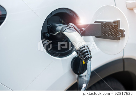 Electric car charging battery at EV charger station or home. green energy power, Eco friendly alternative, technology and environment concepts 92817623