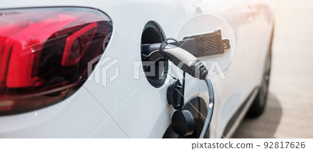 Electric car charging battery at EV charger station or home. green energy power, Eco friendly alternative, technology and environment concepts 92817626