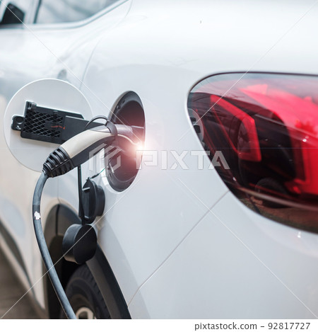 Electric car charging battery at EV charger station or home. green energy power, Eco friendly alternative, technology and environment concepts 92817727