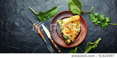 Cheese pie with spinach, copy space Cheese pie with spinach, copy space 92820897