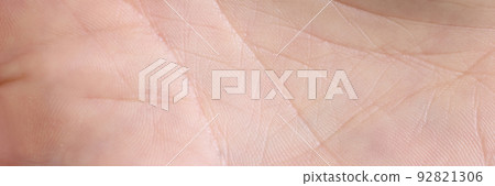 Close-up of a macro line on a white palm arm Close-up of a macro line on a white palm arm 92821306