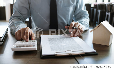 Lawyer Legal counsel presents to the client a signed contract with gavel and legal law. justice and lawyer Business partnership meeting concept. Lawyer Legal counsel presents to the client a signed contract with gavel and legal law. justice and lawyer Business partnership meeting concept. 92823739