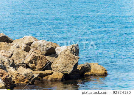 Breakwater or Groyne made of Giant Boulders - Mediterranean Sea Italy 92824180