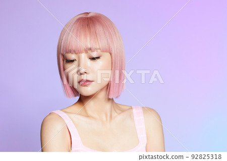 Beauty portrait of young woman with pink hair 92825318
