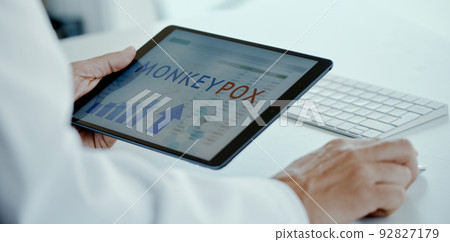 text monkeypox in a tablet, web banner text monkeypox in a tablet, web banner 92827179