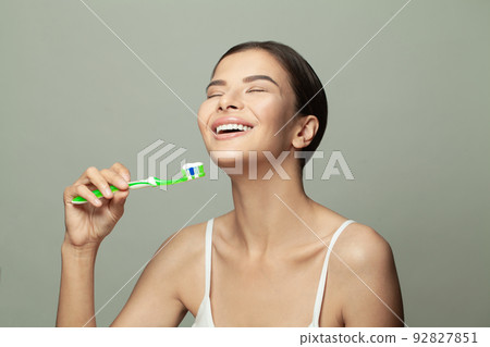 Beautiful young woman smile. Dental health background. Beautiful young woman smile. Dental health background. 92827851