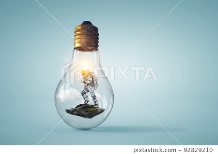 Spaceman inside light bulb . Mixed media Spaceman inside light bulb . Mixed media 92829210