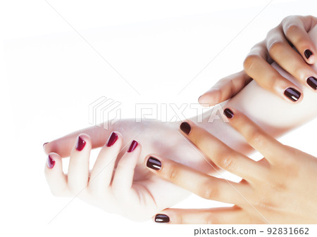 woman hands together manicured african tan and caucasian white isolated gesturing, lifestyle diverse people close up 92831662