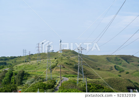 Steel towers and power lines on the hill 92832039
