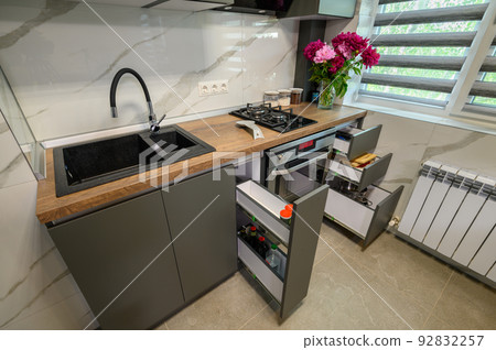 Interior of modern trendy grey kitchen Interior of modern trendy grey kitchen 92832257