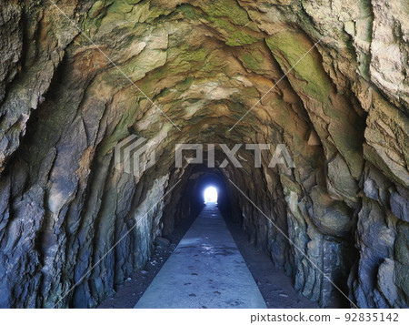 A tunnel leading to a cave (Hanganfune Kakushi) under the Kakuda Cape Lighthouse in Niigata 92835142