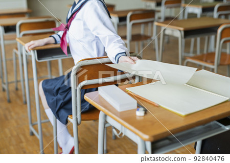 High school girl giving a classroom print High school girl giving a classroom print 92840476