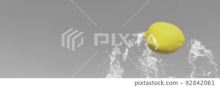 splash. lemon and water splash. lemon and water 92842061