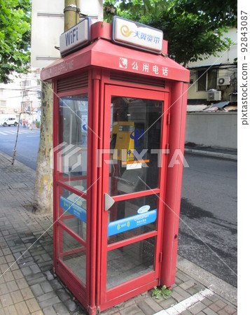 Public phones are becoming less common in Chinese cities than they used to be. 92843087