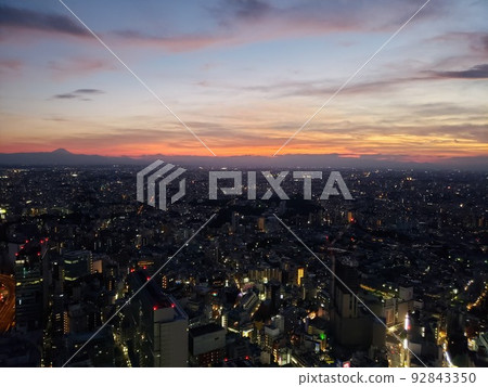 View of the cityscape of Tokyo at dusk from the top of a skyscraper in front of Tokyo Metro Shibuya Station in Shibuya Ward, Tokyo [July] 92843350
