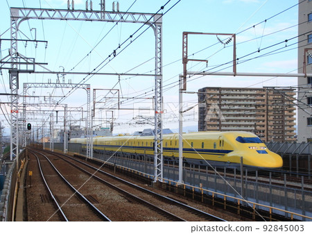 Doctor Yellow running on the Tokaido Shinkansen, which runs parallel to the Hankyu Kyoto Line 92845003