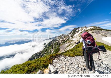 Climbers overlooking Mt. Shirouma 92847543