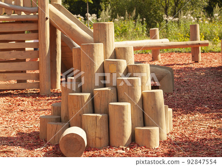 wooden stumps on the playground. 92847554