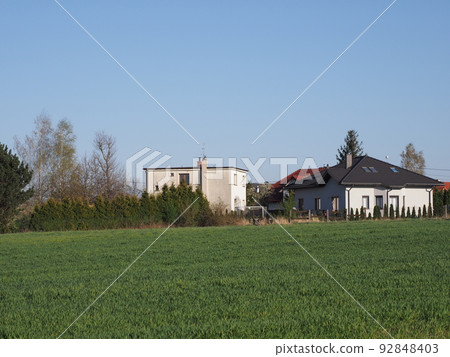 Green terrain and houses in Bielsko-Biala city in Poland 92848403