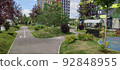 children's playground in a modern residential complex of apartment buildings 92848955