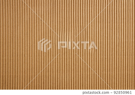 Craft Striped Corrugated Paper Texture Background. Recycling Material. Closeup shot 92850961