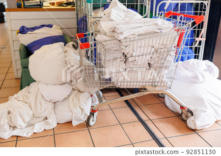 Clean and used sheets in a hostel 92851130