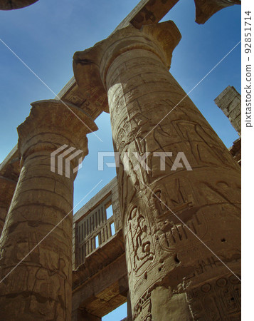 Columns of the ancient Egyptian temple of Karnak at Luxor in Egypt. Columns of the ancient Egyptian temple of Karnak at Luxor in Egypt. 92851714