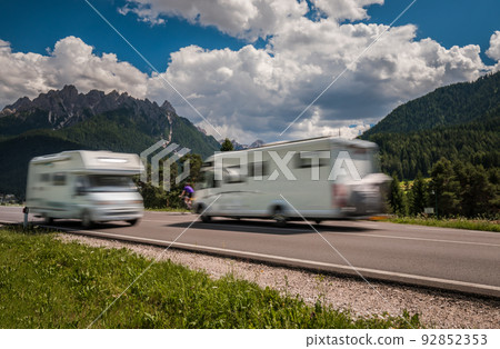 Family vacation travel, holiday trip in motorhome RV, caravan car motion blur 92852353