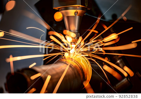 CNC Laser cutting of metal, modern industrial technology. CNC Laser cutting of metal, modern industrial technology. 92852838