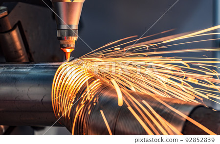 CNC Laser cutting of metal, modern industrial technology. CNC Laser cutting of metal, modern industrial technology. 92852839