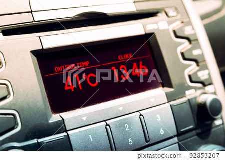 Summer hot temperatures. High temperature on car dashboard display 92853207