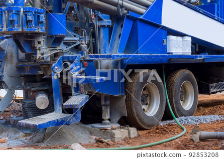 Portable hydraulic water well drilling rig with water extraction on a private plot Portable hydraulic water well drilling rig with water extraction on a private plot 92853208