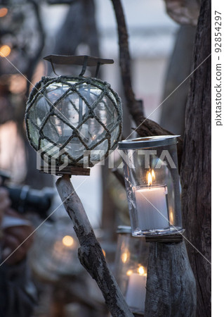 Beautiful event with many candles lit Beautiful event with many candles lit 92854297
