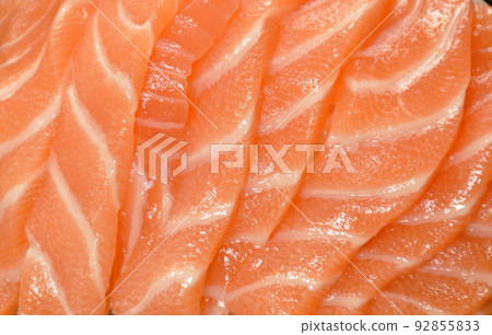 fresh slice salmon sashimi Japanese food topping chop rasish dressing wasabi and shoyu soy sauce on plate fresh slice salmon sashimi Japanese food topping chop rasish dressing wasabi and shoyu soy sauce on plate 92855833