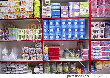 Colorful Varieties Plastic houseware products on the supermarket Shelf Colorful Varieties Plastic houseware products on the supermarket Shelf 92857362