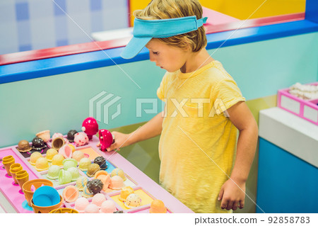 Children play as ice cream seller. Children play as ice cream seller. 92858783