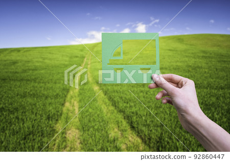 Hand holds green logistics symbol in hand 92860447