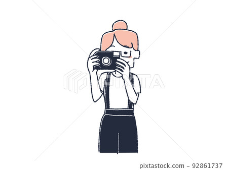 A woman holding a camera in front A person taking a picture 92861737