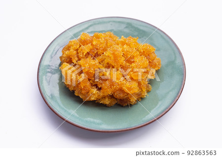 Pineapple paste or jam on white background. 92863563