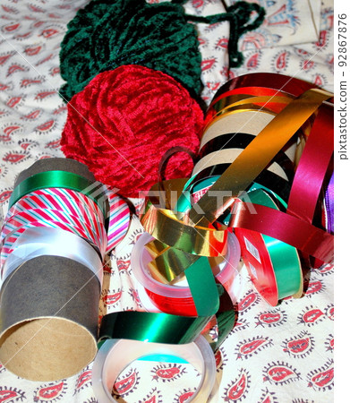 Gift wrapping items for the christmas holiday season. 92867876