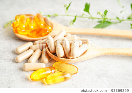 Alternative medicine herbal organic capsule with vitamin E omega 3 fish oil, mineral, drug with herbs leaf natural supplements for healthy good life. Alternative medicine herbal organic capsule with vitamin E omega 3 fish oil, mineral, drug with herbs leaf natural supplements for healthy good life. 92869269