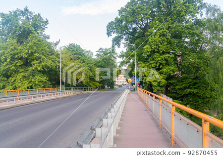 Entrance into Gorlitz city from border bridge between Poland and German. View of Gorlitz in the morning. Entrance information signs in german language. 92870455