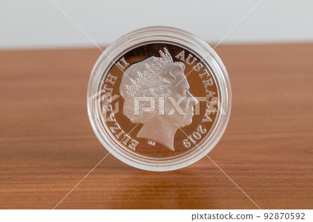 One Australian dollar silver coin. Icon of Elizabeth II on 1 oz silver coin. 92870592