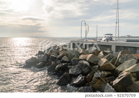Sunny view on east breakwater of Sopot marina, Poland. 92870709