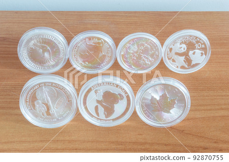 Few different silver coins, silver money. Few different silver coins, silver money. 92870755
